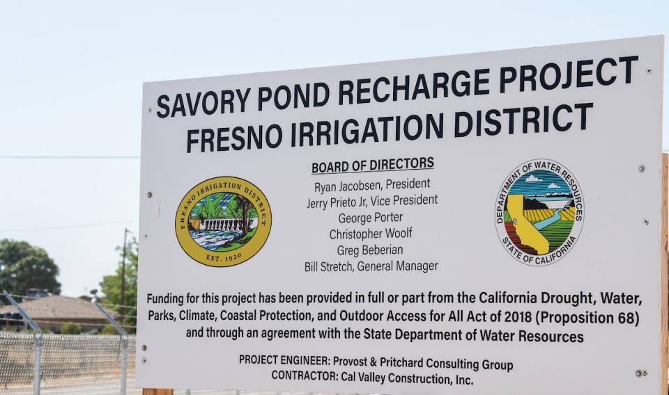Sign commemorating the opening of a recharge basin in Fresno county. 