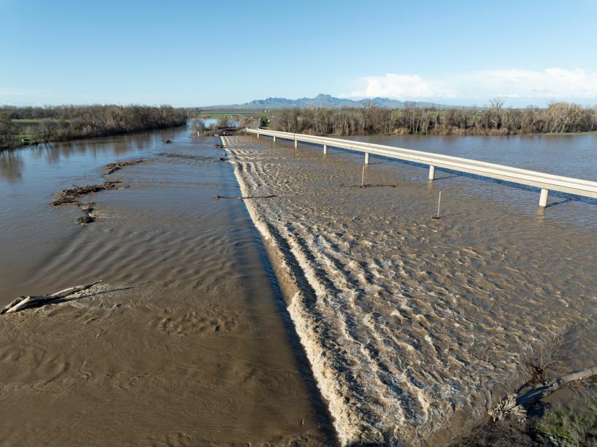 Image shows floodwaters from a series of atmospheric rivers that caused a road closure at Highway 20 near Williams in Colusa County in January 2023. 
