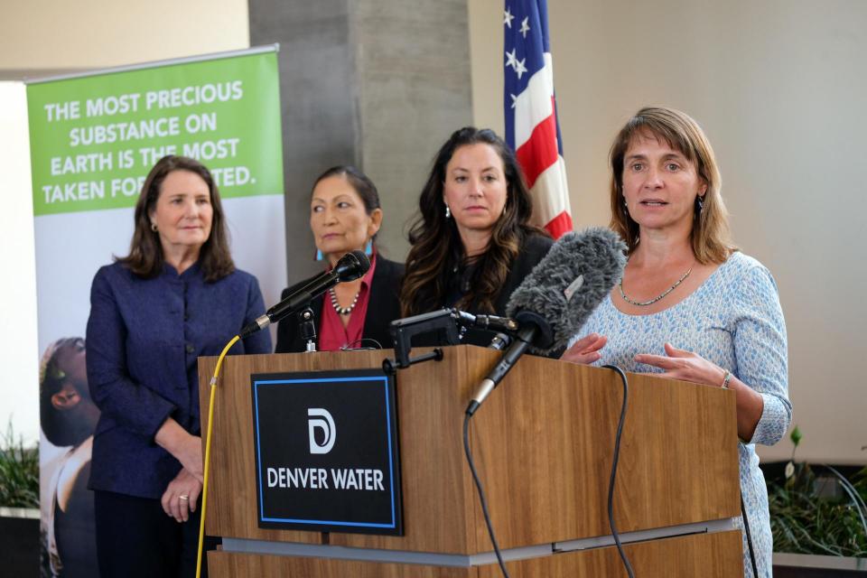 Tanya Trujillo, assistant secretary of the Interior, speaks speaks during a stop while on a tour of Colorado this summer with Interior Secretary Deb Haaland (second from left). 