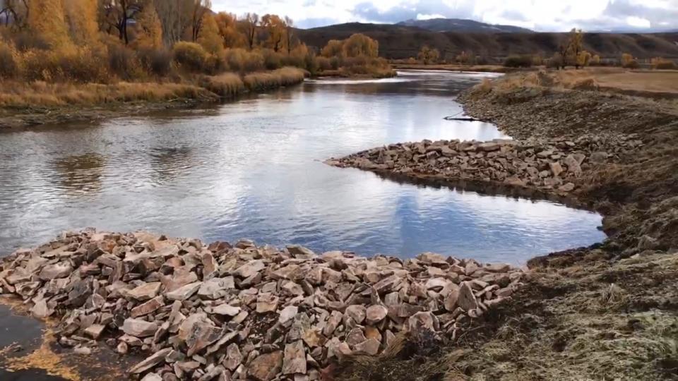 Strategic placement of rocks promotes a more natural streamflow that benefits ranchers and fish. 