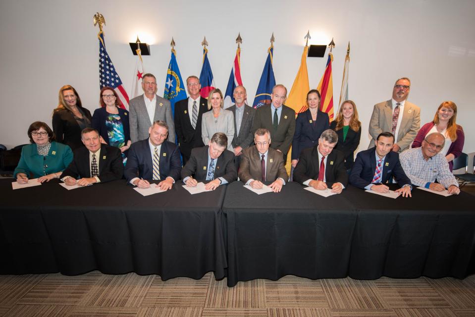 Jayne Harkins (seated, far left), as executive director of the Colorado River Commission of Nevada, was one of the signers in 2017 of domestic agreements that were part of Minute 323, the addendum to the 1944 U.S.-Mexican Water Treaty. 