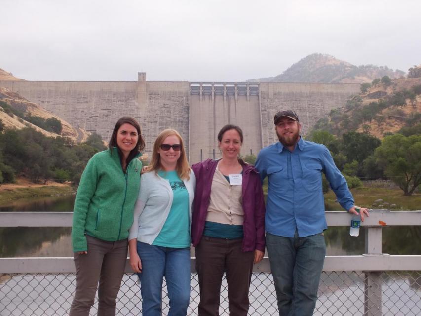 Tour guests in front of Friant Dam
