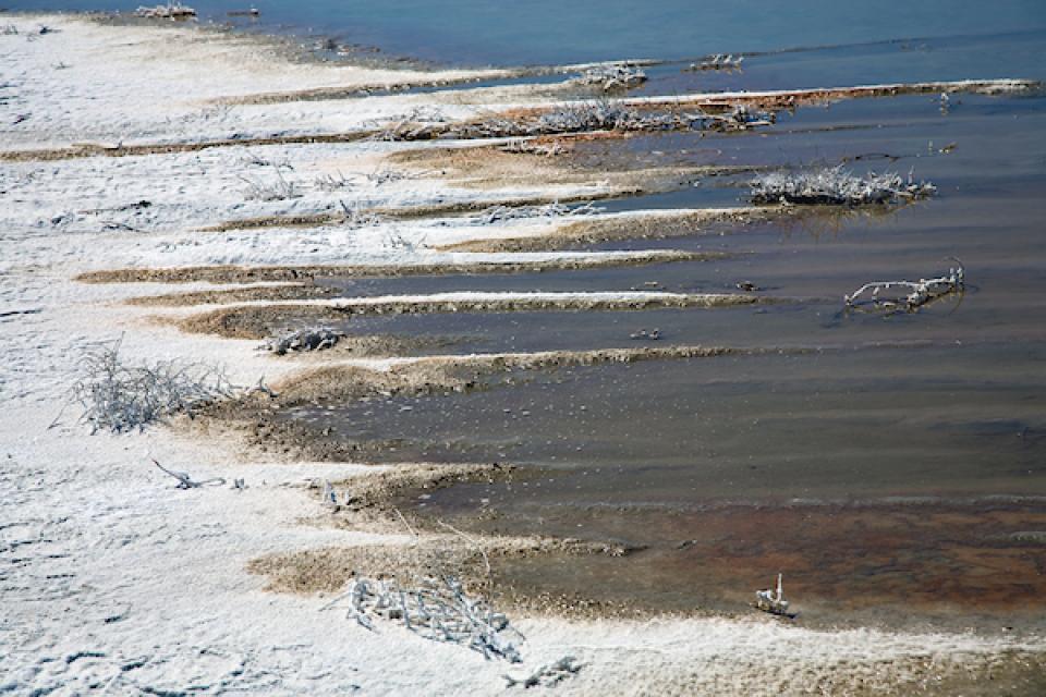 An evaporation pond in Kings County, in the central San Joaquin Valley, with salt encrusted on the soil. 