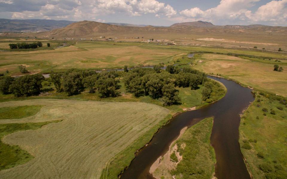 The Upper Colorado River meanders through the high plateau around Kremmling, Colorado. 