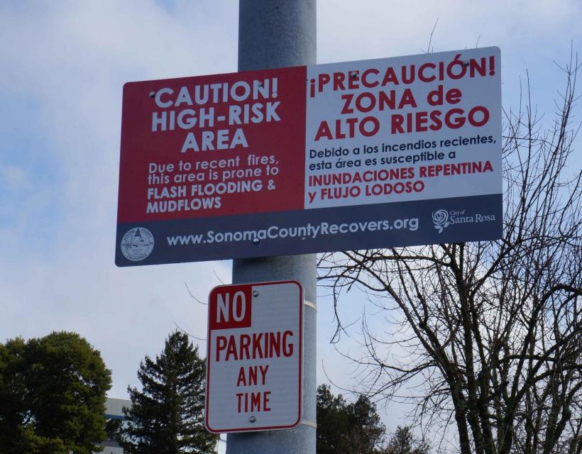 A sign in a Santa Rosa neighborhood warning the public of the risk of flash flooding and mud flows  from areas burned in the 2017 Tubbs Fire. 