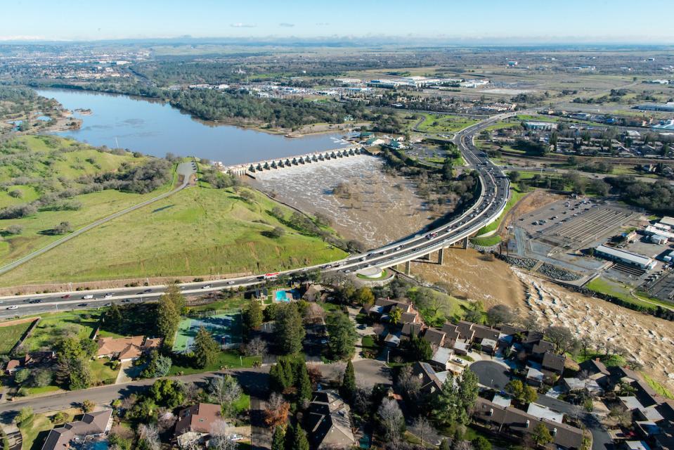 Aerial view of Nimbus Dam near Sacramento during high water. 