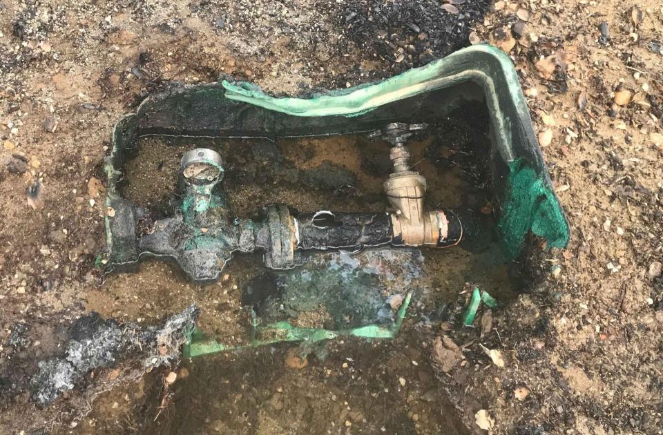 Heat and flames melted many water utility boxes, meters and pipelines in the Woolsey and Camp fires. 