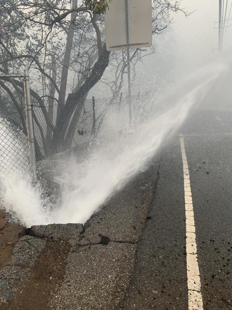 A water line ruptured in the Woolsey Fire. Crews from Las Virgenes Municipal Water District were kept busy repairing ruptured water lines during the fire. 