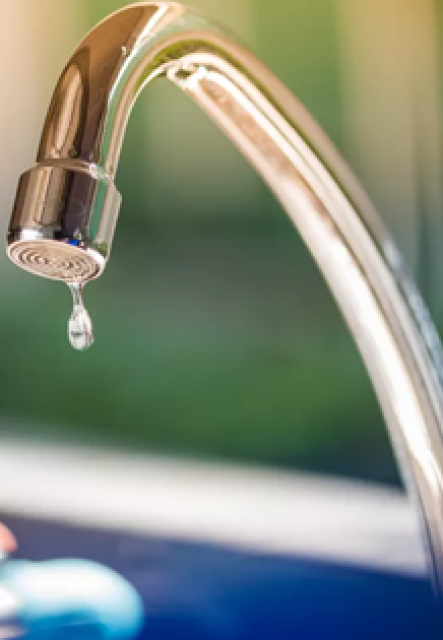 Image of a dripping faucet.