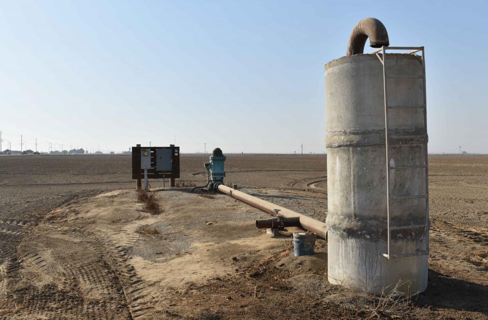 A groundwater well pump in a San Joaquin Valley field that's ready for planting.