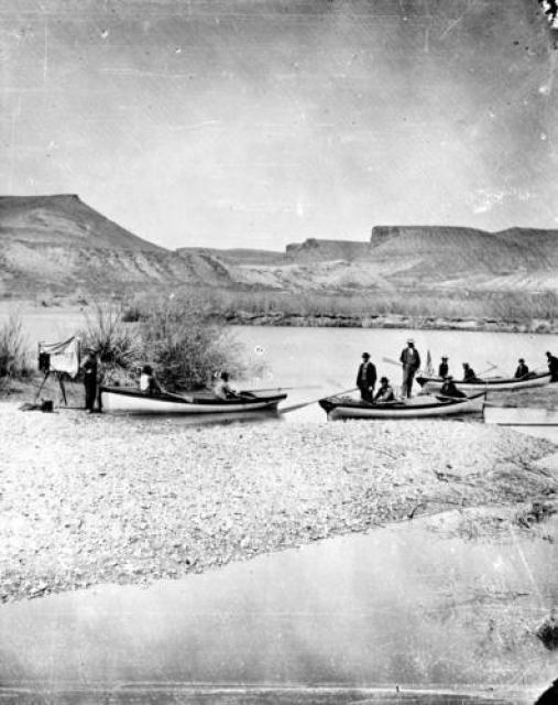 Boats from Powell's second expedition down the Colorado River, pulled up on shore.