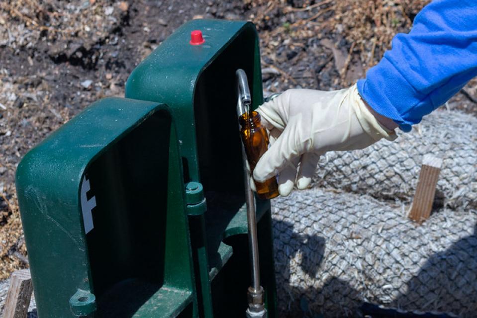 Testing water for signs of contamination at a neighborhood burned in the 2017 Tubbs Fire.  