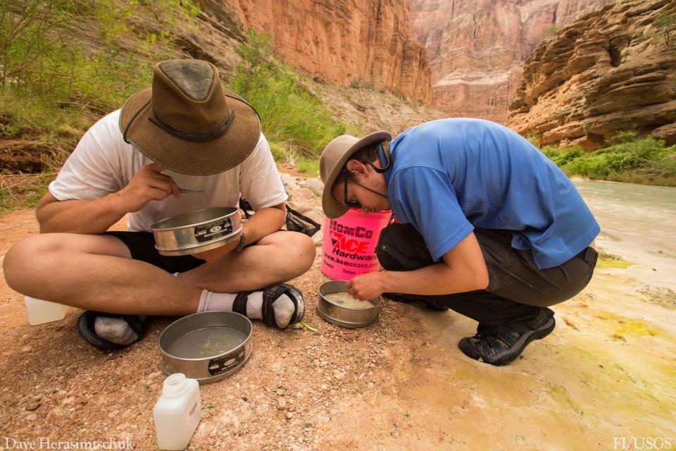 USGS scientists Josh Smith and Jeff Muehlbauer collect samples of aquatic insects from Havasu Creek, Grand Canyon, Ariz..