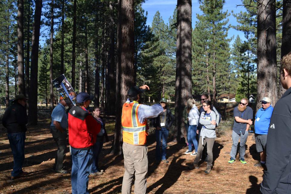 Jason Burke took 2017 Headwaters Tour participants to see where stormwater is pumped into the forest above the city of South Lake Tahoe to keep it from flooding the city and flowing into the lake.