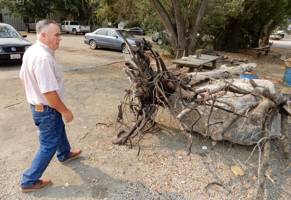 Roger Cornwell, general manager of River Garden Farms, with an example of a refuge like the ones that were lowered into the Sacramento River at Redding to shelter juvenile salmon.