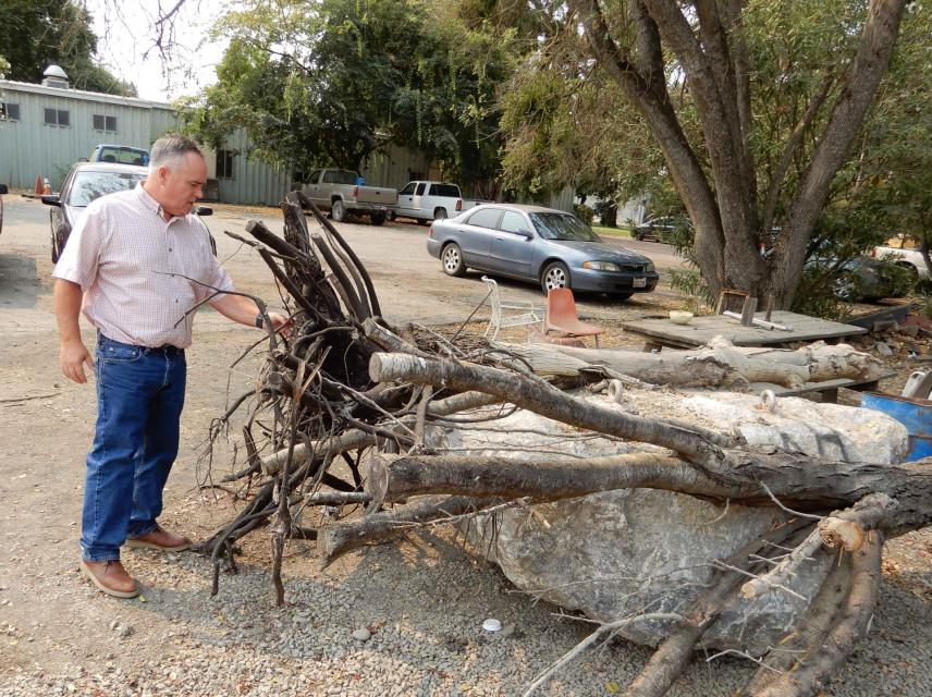 Roger Cornwell, general manager of River Garden Farms, with an example of a salmon refuge. 